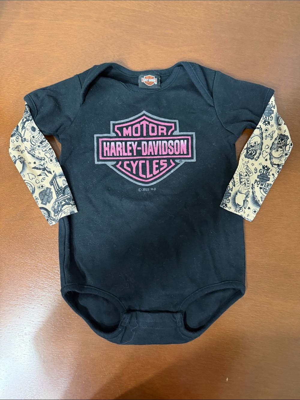 Harley-Davidson Black One-Piece with Pink Logo and Tan Sleeves